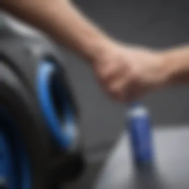 Worker applying blue seal thread sealant