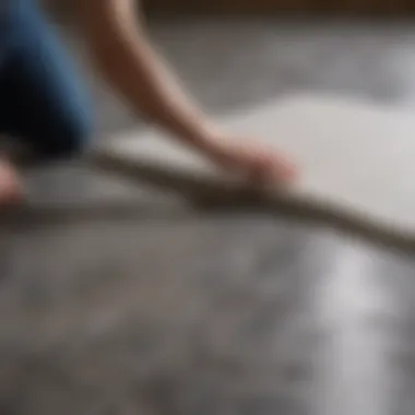 Close-up of floor protection paper being applied to a new floor
