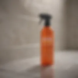 Close-up of a mold remover spray bottle positioned against a bathroom tile background