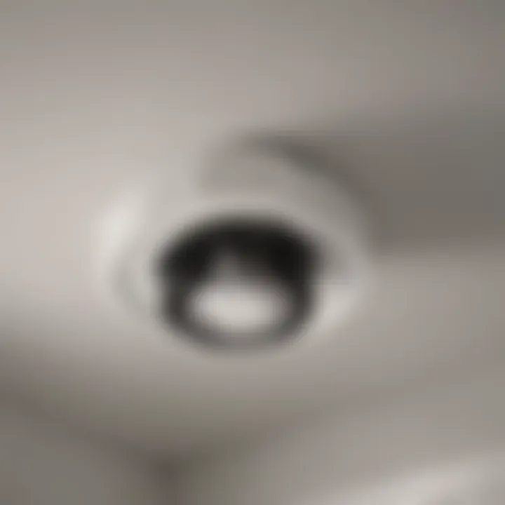 Close-up view of a Broan bathroom exhaust fan light assembly.