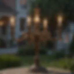 Elegant candelabra base light fixture illuminating a garden at dusk