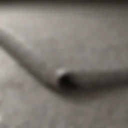 Close-up of a plastic carpet protector sheet showing texture and thickness