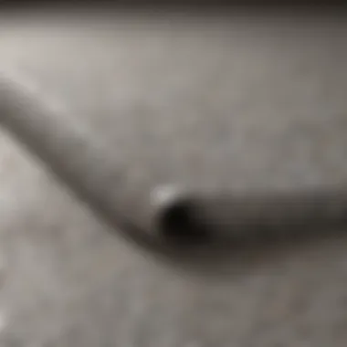 Close-up of a plastic carpet protector sheet showing texture and thickness