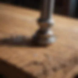 Close-up of a broken screw embedded in a wooden surface