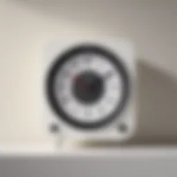 A sleek and modern RCA clock on a minimalist white background