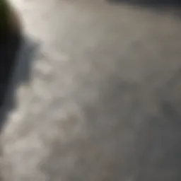 Modern rough concrete driveway design with geometric patterns