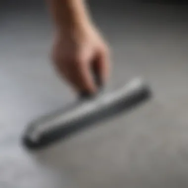 Close-up of ergonomic handle of curved squeegee