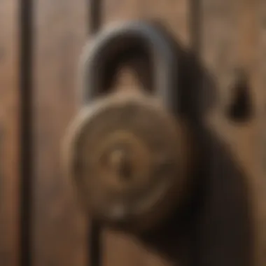 A close-up view of a vintage padlock resting on an antique wooden surface, showcasing its intricate design.