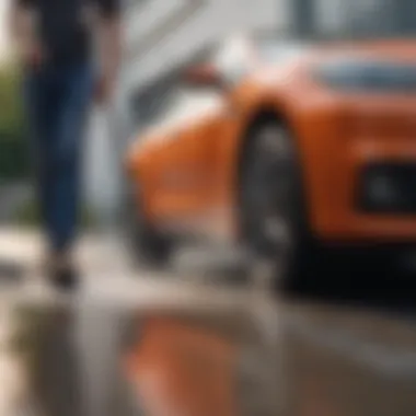 Revitalizing Surfaces: The Application of Electric Power Washers Demonstration of an electric power washer in use on a driveway