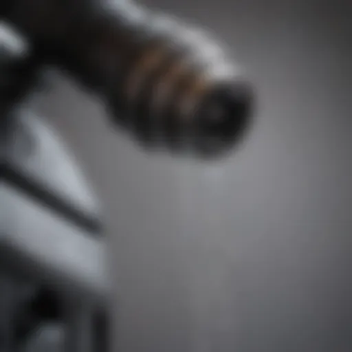 Close-up of an electric power washer nozzle demonstrating pressure control