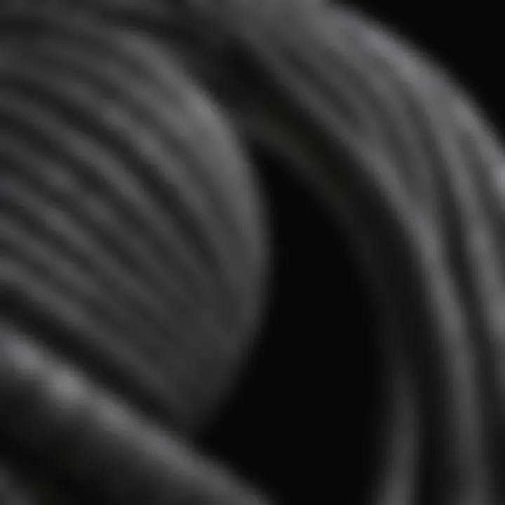 A close-up view of a short coiled water hose demonstrating its unique design.