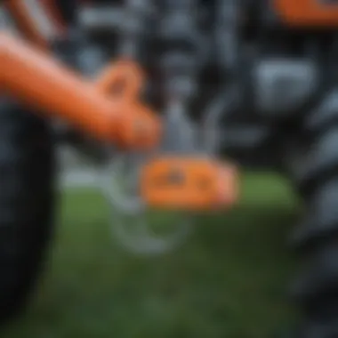 Detailed view of the components of a lawn tractor pin hitch