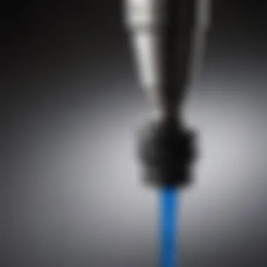 Close-up of Graco sprayer extension pole nozzle