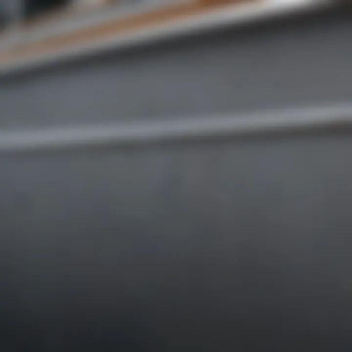 Close-up of gray paint texture on a boat's hull, highlighting its durability.