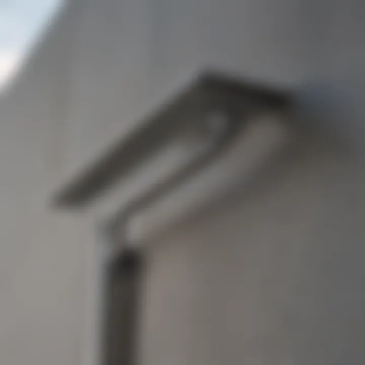 A close-up of a hidden gutter hanger