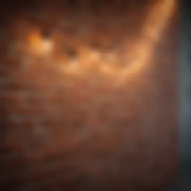 Close-up of string lights elegantly draped against a textured brick wall, showcasing vibrant illumination.