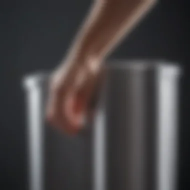 Handle Ergonomics Evolution Ergonomically designed trash can handle by Knape & Vogt