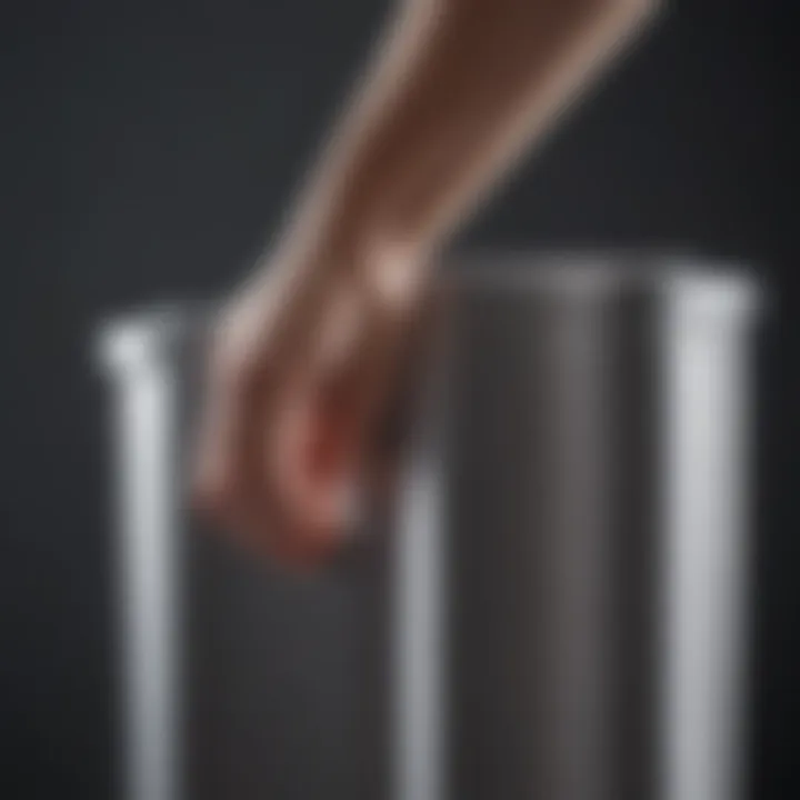 Handle Ergonomics Evolution Ergonomically designed trash can handle by Knape & Vogt