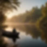 A serene lake with a fisherman in a boat at sunrise