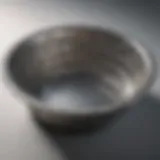 Metal dish scrubber with intricate design