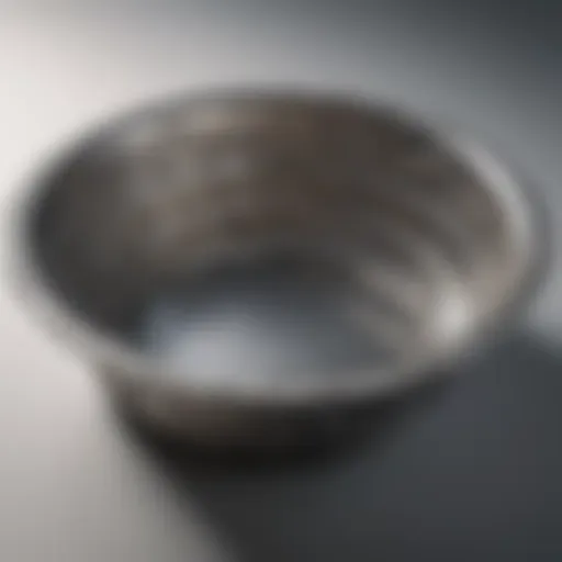 Metal dish scrubber with intricate design