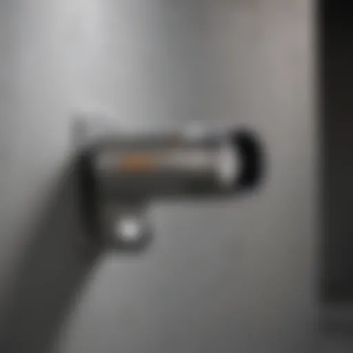 Detailed view of a metal scanner detecting pipes behind drywall