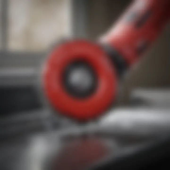 Detailed view of the ergonomic design of the Milwaukee rotary cutter.