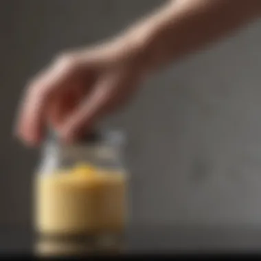 User effortlessly opening a jar with Oxo Good Grips Jar Opener