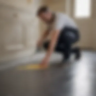 Precision Floor Preservation Method Painter Applying Floor Protection Tape