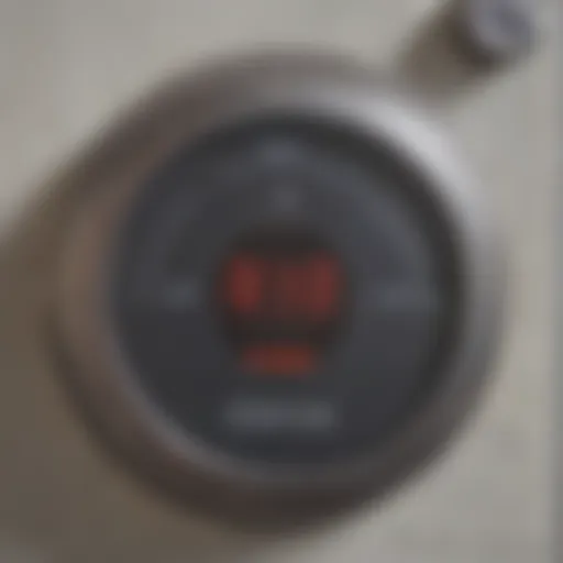 Detailed view of a Reliance water heater thermostat