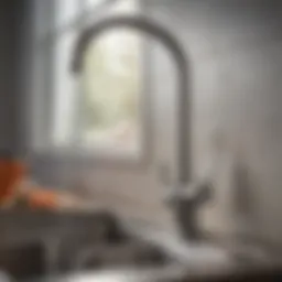 Detailed view of a kitchen sink faucet showing a leak