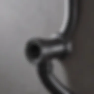 Rubber plumbing elbow in a complex plumbing system