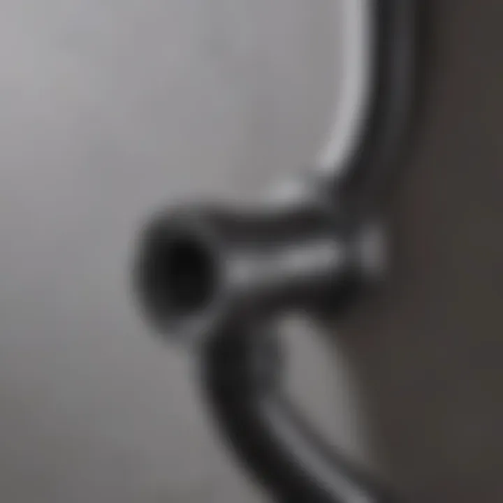 Rubber plumbing elbow in a complex plumbing system