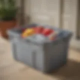 Rubbermaid Roughneck Storage Tote in Gray Sleek gray Rubbermaid Roughneck storage tote showcased outdoors