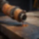 Close-up of a rust cutter in action on a metal surface