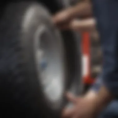 Tire Wear Inspection RV tires being checked for wear and tear