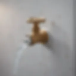 Water dripping from damaged refrigerator water line valve