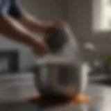 Steel scrubber cleaning a dirty pot