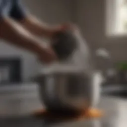 Steel scrubber cleaning a dirty pot