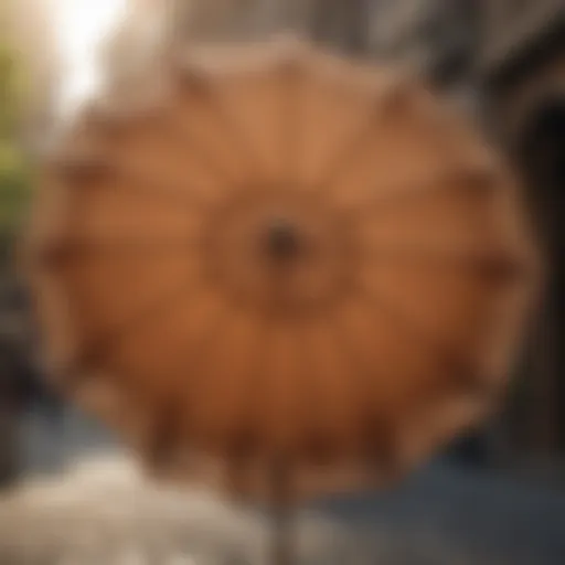 Elegant tan market umbrella with intricate design