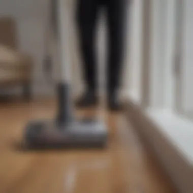 A user effortlessly cleaning a tight corner with a handheld vacuum