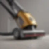 A modern handheld vacuum cleaner on a sleek surface