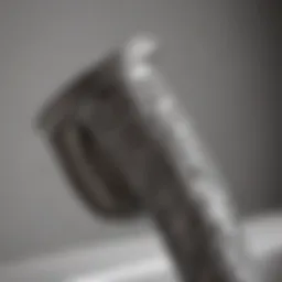 Close-up view of a tub spout pipe showcasing its intricate design