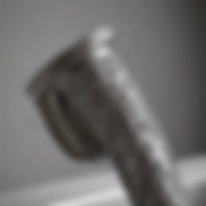 Intricate Design of Tub Spout Pipe Close-up view of a tub spout pipe showcasing its intricate design