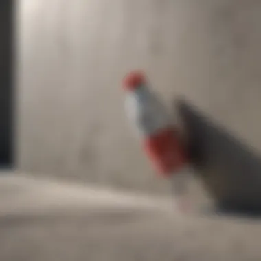 Artist using spray paint on concrete wall with precision