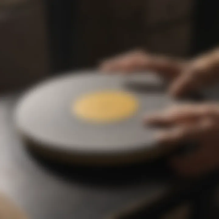 A sandpaper grinding disc in action, smoothing a rough surface