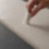 Close-up of adhesive primer application on substrate