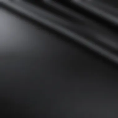 Close-up view of black vinyl plastic sheet texture