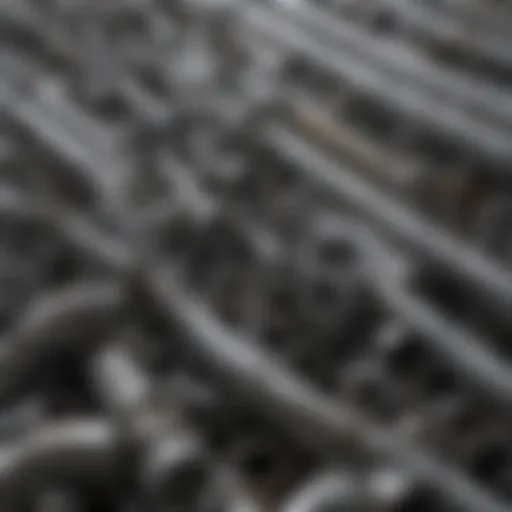 Various types of galvanized pipe accessories displayed neatly