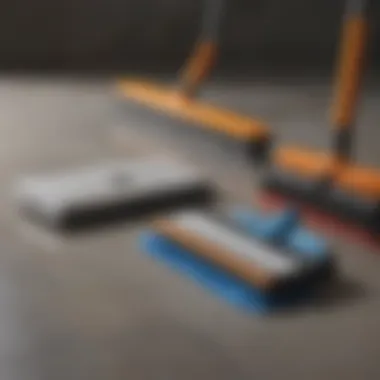 Different types of floor squeegees side by side